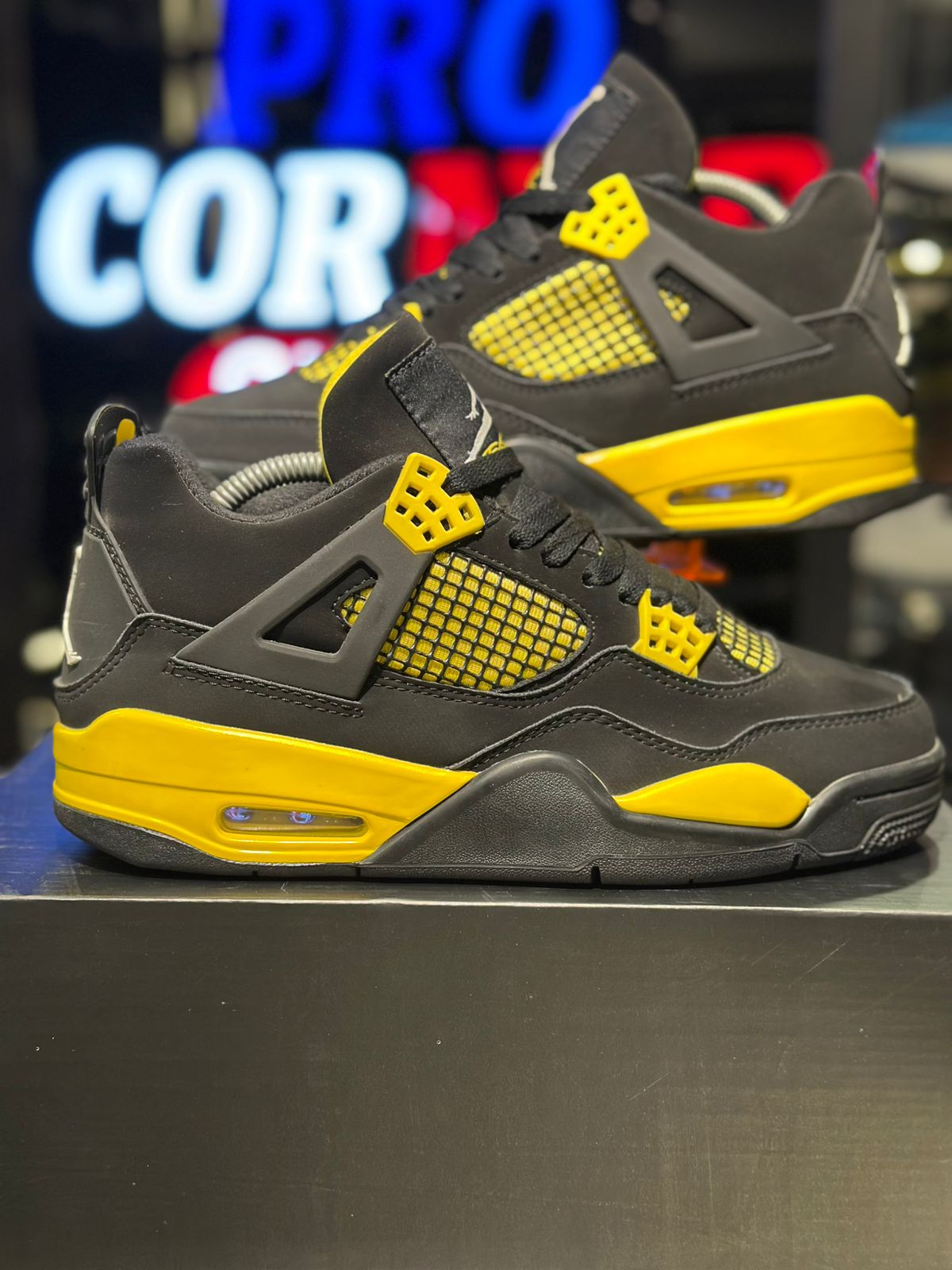 Jordan 4 Yellow Thunder